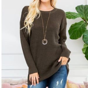 Lightweight waffle weave tunic length sweater.